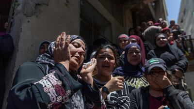 Israeli soldiers opened fire at a Palestinian vehicle at an army checkpoint yesterday, killing Daraghmeh, a passenger, and critically wounding another, the Palestinian health ministry said. AP Photo
