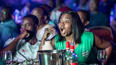 Nigeria fans gather to watch the semi-final. AFP