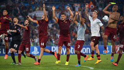 AS Roma's captain Francesco Totti celebrates with teammates after their 5-1 Champions League victory over CSKA Moscow on Wednesday in Rome. Alberto Pizzoli / AFP