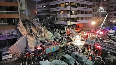First responders and residents gather at the site of an Israeli airstrike in Beirut's Tallet al-Khayyat neighbourhood. AFP