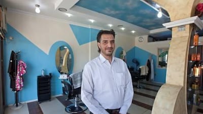 AbdulHadi Al Zaabi manages the Al Taous grooms' salon in Ras Al Khaimah.