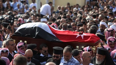 People attend a funeral held for victims of a terrorist attack at a Greek Orthodox church in Himoud, Jordan earlier this week. Getty Images