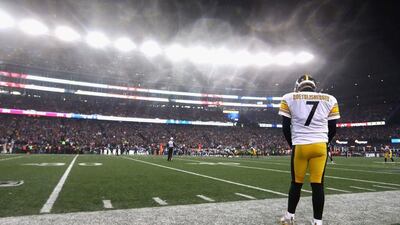 Ben Roethlisberger of the Pittsburgh Steelers looks on from the sideline. Al Bello / AFP