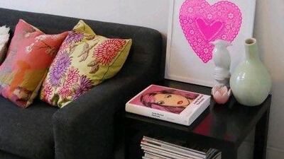 Bianca calls her living room a blank canvas filled with colourful accessories, including her pink Life Would be Rubbish Without You heart doily screen-print. Courtesy of Kiss Her by Bianca Hall