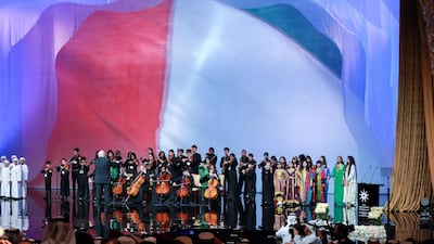 Children sing the UAE National Anthem at the beginning of the awards. Victor Besa / The National