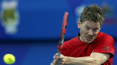 Japan Warriors’ Thomas Enqvist hits a return against Indian Aces’ Fabrice Santoro during their match in Dubai. Ahmed Jadallah/ Reuters