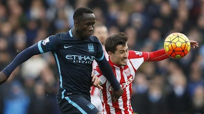 Manchester City’s Bacary Sagna in action with Stoke City’s Bojan Krkic. Reuters / Carl Recine