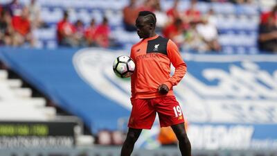Liverpool forward Sadio Mane warms up before the match. Lee Smith / Reuters