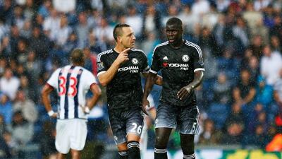 John Terry of Chelsea talks to teammate Kurt Zouma during their win over West Bromwich Albion on Sunday in the Premier League. Julian Finney / Getty Images / August 23, 2015