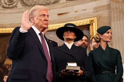 Mr Trump takes the oath of office. Getty Images
