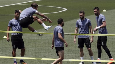 From left: Asensio, Sergio Ramos, Dani Carvajal, Nacho Fernandez and Kiko Casilla take part in the team's training session. Mariscal / EPA