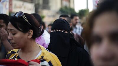 Egyptian protestors from different political opposition parties and different religions shout slogans as they march towards St. Mark’s Coptic Orthodox Cathedral in Abbassia to denounce sectarian violence and the Egyptian government. Gianluigi Guercia / AFP