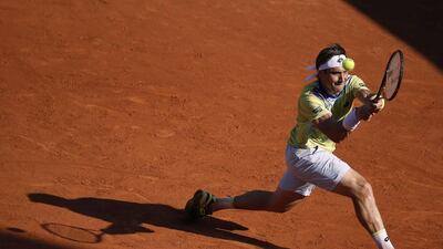 Spain’s David Ferrer returns the ball to Italy’s Simone Bolelli during the men’s third round of the Roland Garros 2015 French Tennis Open in Paris on May 30, 2015. AFP PHOTO / KENZO TRIBOUILLARD
