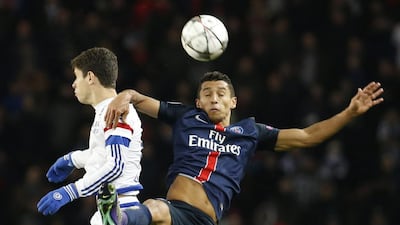 Paris St Germain’s Marquinhos in action with Chelsea’s Oscar. Reuters / Gonzalo Fuentes