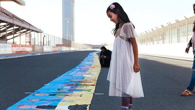 The Al Tayer Group and Dubai Autism Centre have set a new world record for the world’s longest painting, which was designed to increase awareness about autism in local communities. Anna Nielsen for The National