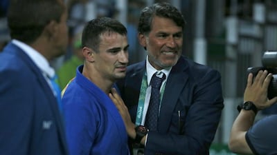 UAE judoka Sergiu Toma, left, celebrates with Naser Al Tamimi, the general secretary of the UAE Wrestling, Judo and Kickboxing Federation at Rio 2016.