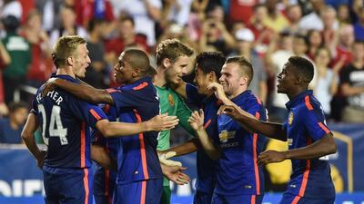 Manchester United players celebrate after their penalty shootout win over Inter Milan on Tuesday at the International Champions Cup pre-season tournament in the US. Nicholas Kamm / AFP
