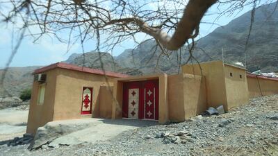 An older, single-storey concrete house in Wadi Qada'a.