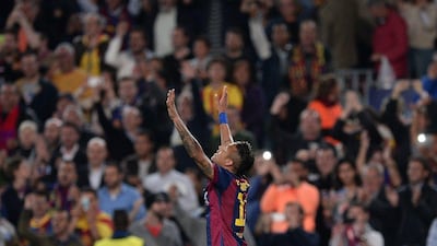 Barcelona's Neymar celebrates after scoring one of his two goals as his side advanced past PSG into the Champions League semi-finals on Tuesday. Josep Lago / AFP