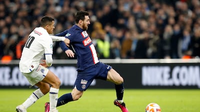 Alexis Sanchez, left, of Olympique Marseille and Lionel Messi of Paris Saint-Germain in action. EPA