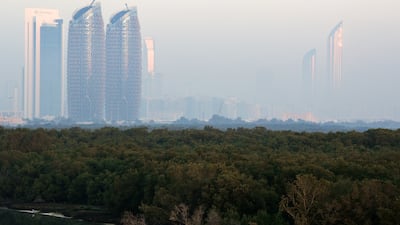 The National Centre of Meteorology issued a yellow alert covering large sections of Abu Dhabi and Dubai. Victor Besa / The National