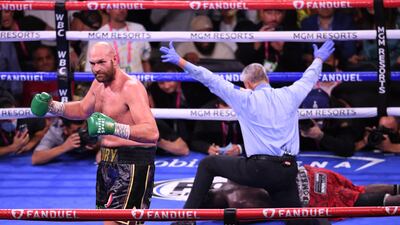 WBC heavyweight champion Tyson Fury starts his celebrations. AFP