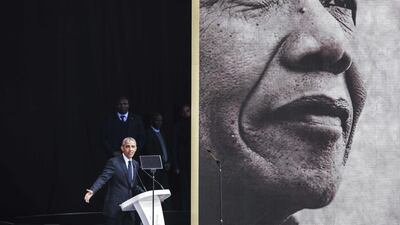 Former US President Barack Obama speaks during the 2018 Nelson Mandela Annual Lecture at the Wanderers cricket stadium in Johannesburg on July 17, 2018. AFP