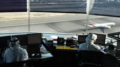 Air-traffic controllers keep track of aircraft movements in the visual control room at the top of the air traffic control centre at Dubai International Airport. Stephen Lock / The National.
