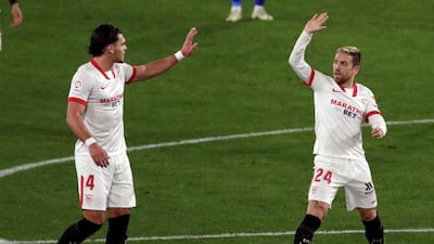 Sevilla FC's Papu Gomez, right, will take on fellow Argentine Lionel Messi in the Cop del Rey. EPA