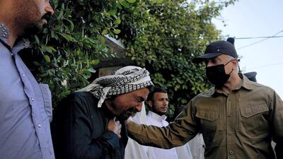 Iraqi Prime Minister Mustafa Al Kadhimi meets with families of the deceased. Courtesy Media Office of the Prime Minister