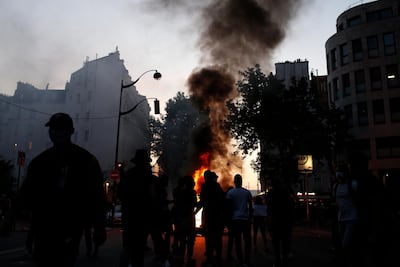 Paris riot police fired tear gas as protesters threw projectiles and set fires at a demonstration against police violence and racial injustice. AP