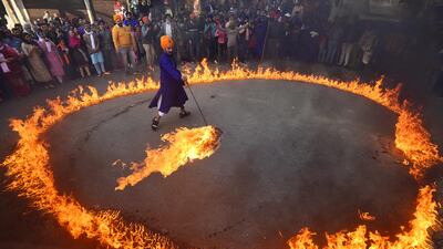 A Sikh performer before anniversary celebrations for Guru Gobind Singh in Prayagraj, India. AFP