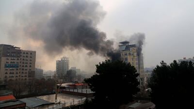 Smoke rises from a hotel in Afghanistan's capital Kabul after it was attacked by gunmen on Monday. EPA