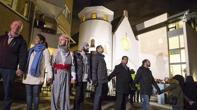 More than 1,000 people formed a "ring of peace" around the Norwegian capital's synagogue, an initiative taken by young Muslims in the country after a series of attacks against Jews in Europe, in Oslo. AP Photo / Hakon Mosvold Larsen