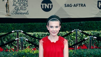 Millie Bobby Brown, wearing red Giorgio Armani, arrives for the Screen Actors Guild Awards in Los Angeles on January 29, 2017. EPA