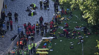 Firefighters and emergency services gather at the building. Getty Images