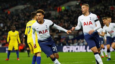 Dele Alli turns to celebrate his opening goal for Tottenham against Chelsea. Reuters