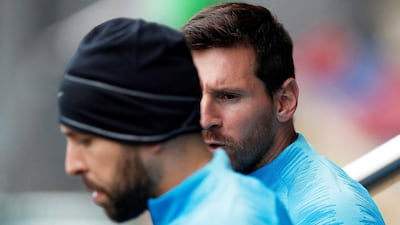 Lionel Messi, right, and Jordi Alba, left. EPA