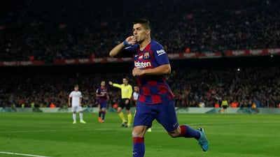 Suarez celebrates after his stunning effort. Reuters