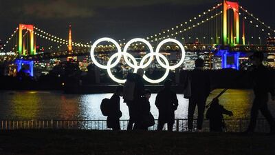 An Olympic rings monument is illuminated at the waterfront of Odaiba Marine Park, in Tokyo. EPA