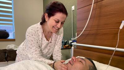 Turkish survivors Seref Demirtas and his wife Rumeysa Demirtas are seen in their hospital room, a day after a plane crash in Istanbul. The Turkish couple recounted the harrowing moments during a crash landing in Istanbul that killed three people and left a Turkish airliner crumpled into pieces. Rumeysa and Seref survived and she called it a 'miracle.' AP Photo