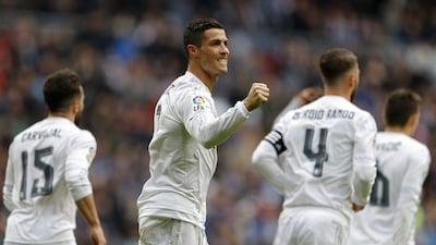 Real Madrid's Cristiano Ronaldo celebrates after scoring a goal against Celta during a Spanish La Liga soccer match between Real Madrid and Celta Vigo at the Santiago Bernabeu stadium in Madrid, Saturday, March 5, 2016. Ronaldo scored four goals in Real Madrid's 7-1 victory. (AP Photo/Francisco Seco)