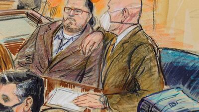 Artist sketch of Guy Wesley Reffitt and his lawyer in Federal Court in Washington. AP