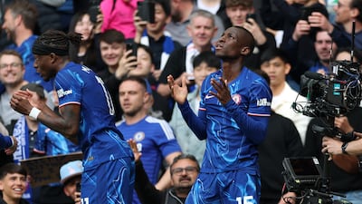 Chelsea's Nicolas Jackson celebrates with Noni Madueke after scoring the first goal against Everton at Stamford Bridge. Reuters