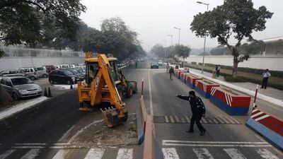 Indian authorities have removed security barriers in front of the US embassy in New Delhi on Tuesday apparently in retaliation for the arrest and alleged heavy-handed treatment of an Indian diplomat in New York. Adnan Abidi / Reuters