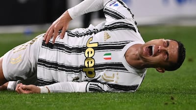 Juve's Cristiano Ronaldo reacts to a Milan tackle. AFP