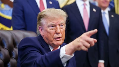 US President Donald Trump takes questions from journalists in the Oval Office on October 20. EPA