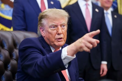 US President Donald Trump takes questions from journalists in the Oval Office on October 20. EPA