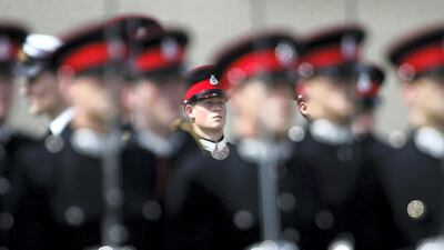 Prince Harry takes part in the Trooping Of New Colours alongside his fellow officer cadets at the Royal Military Academy, Sandhurst in 2005. Getty Images