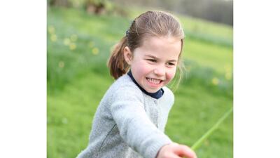 In the photos Charlotte is seen playing in the family's Norfolk garden, at Anmer Hall. A The Duchess of Cambridge via Instagram / Kensington Royal